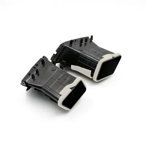 Black and white molded connector housing components