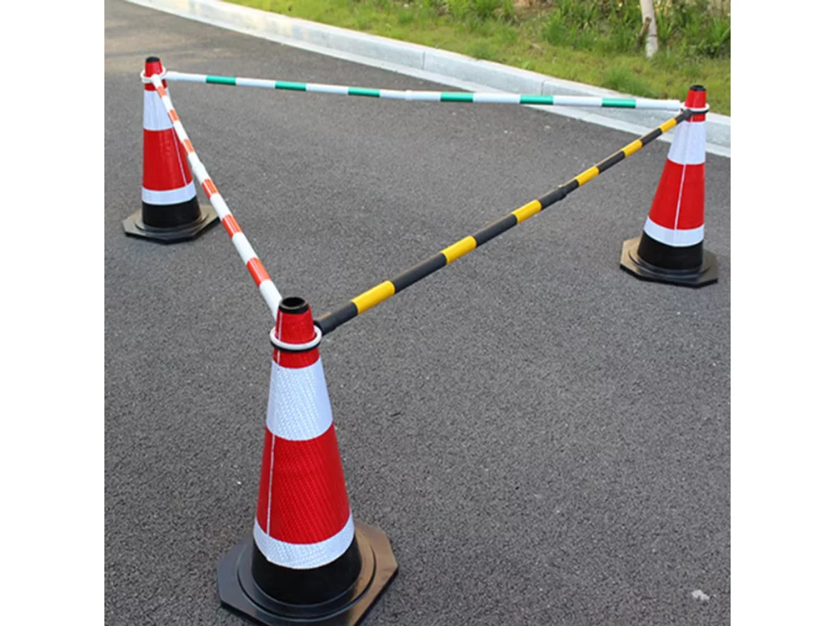 Traffic cones connected by cone bars for a temporary restricted area