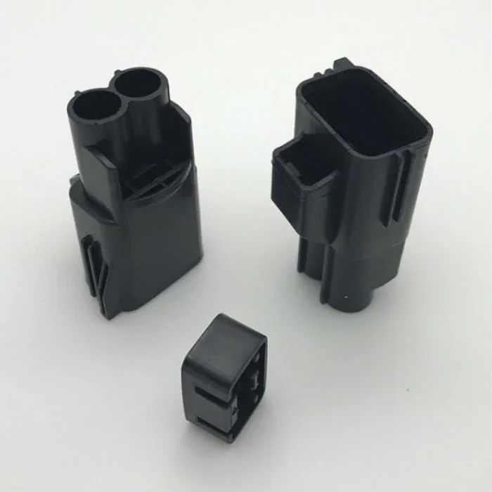 Black custom molded plastic housing components