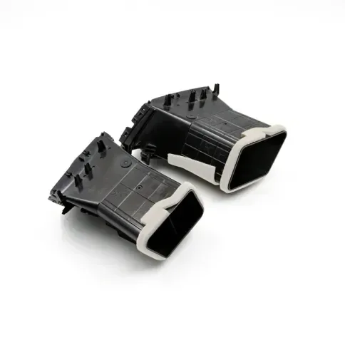Black and white molded connector housing components