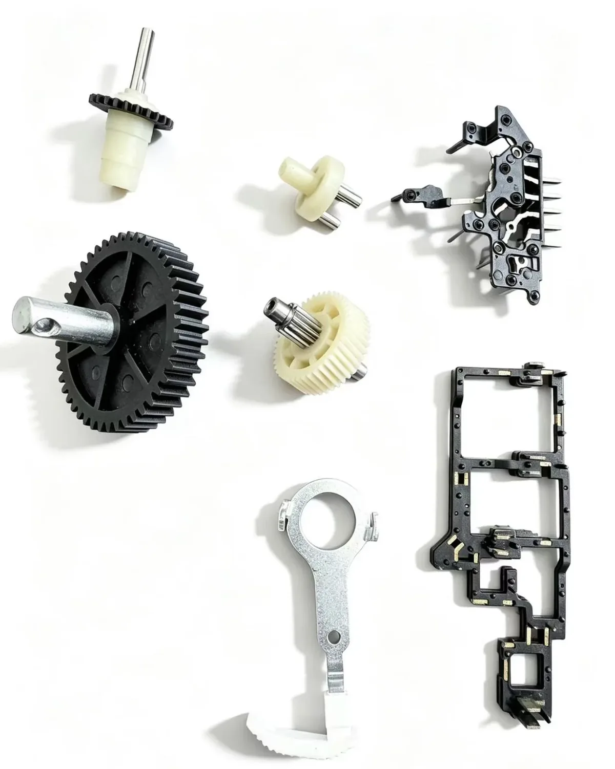 Small molded gears and mechanism components